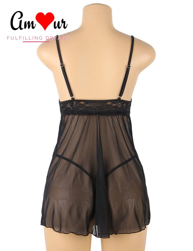 Sheer black lace chemise on mannikin